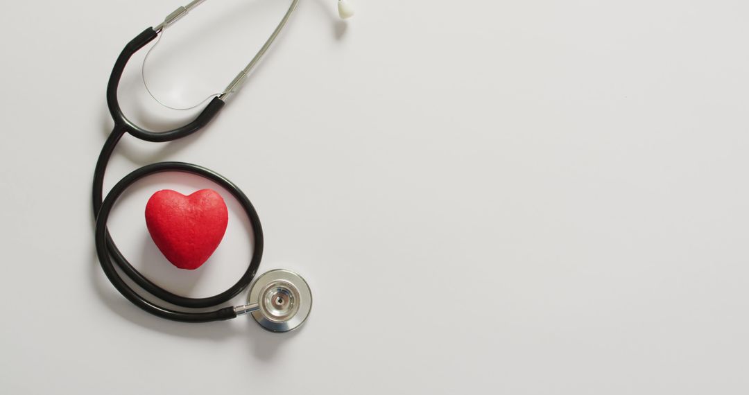 Image of close up of stethoscope with heart on blue background - Free Images, Stock Photos and Pictures on Pikwizard.com