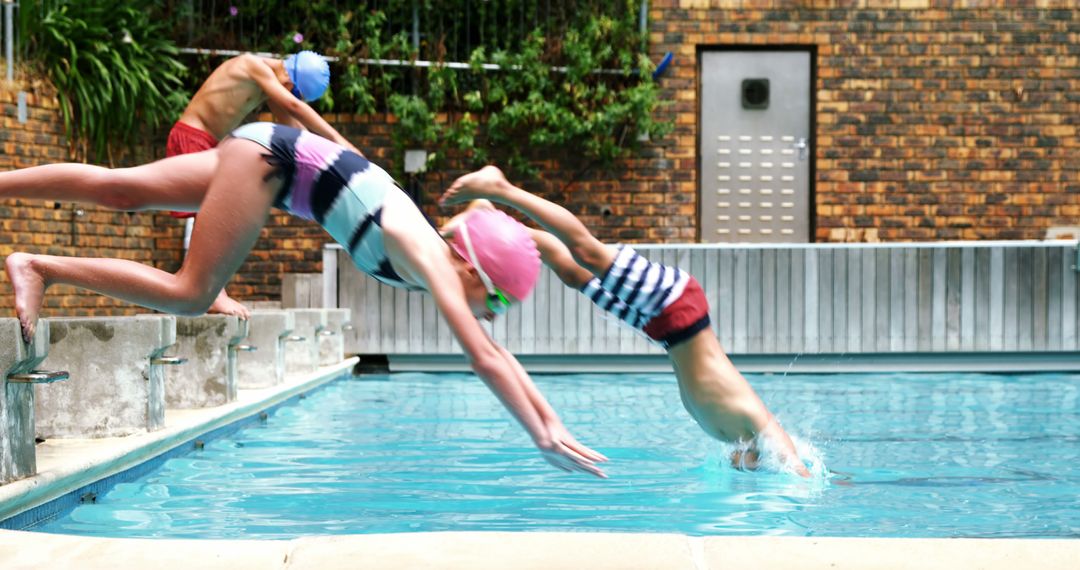 Children Jumping into Swimming Pool with Swim Caps and Goggles - Free Images, Stock Photos and Pictures on Pikwizard.com