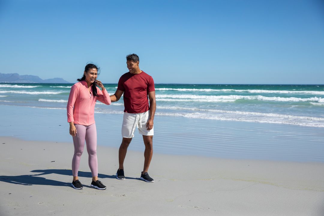 Active Couple Enjoying a Day at the Beach