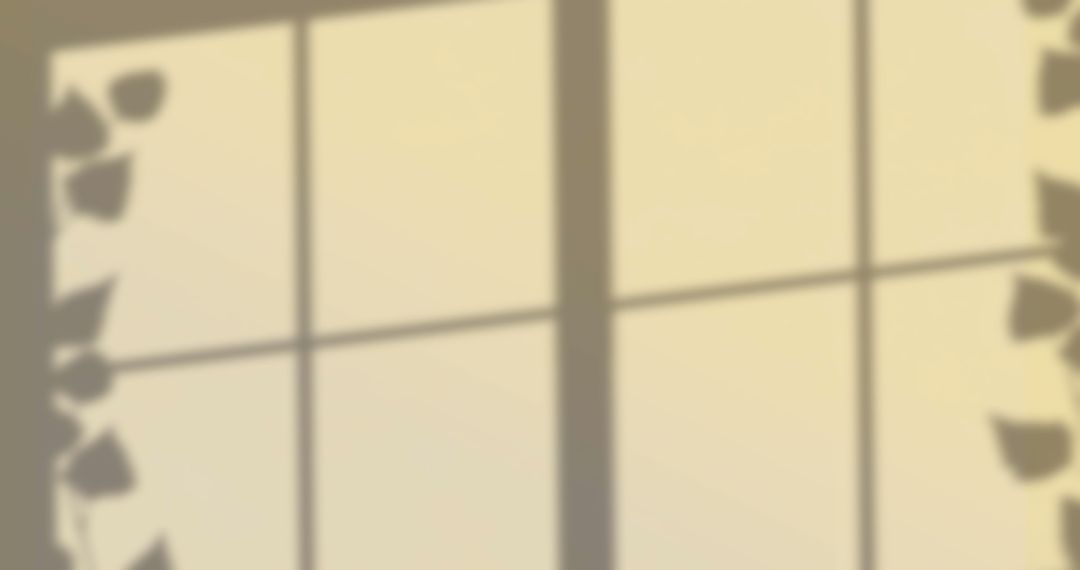 Window Shadow Pattern with Leaves on Yellow Background