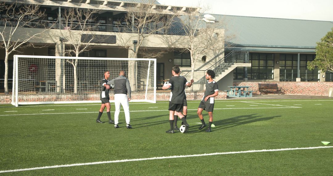 Youth Soccer Players Practicing Ease Passing on School Field