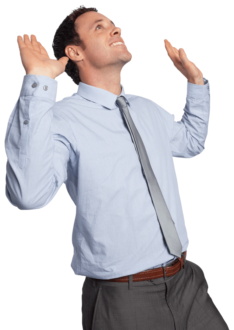 Joyful Businessman Celebrating Success with Hands Pushed Up