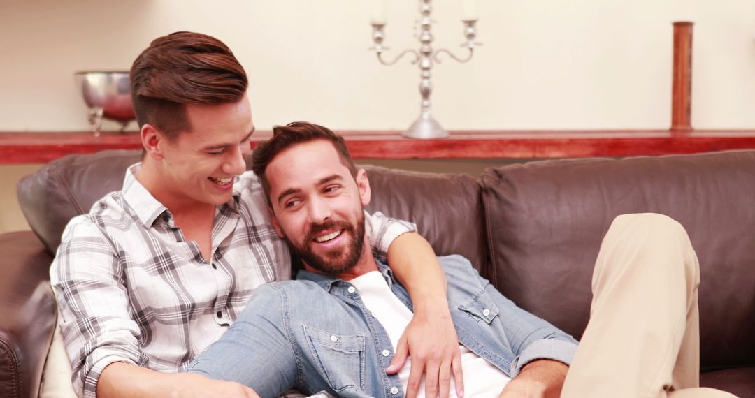 Young Couple Enjoying Cozy Moment on Comfortable Sofa