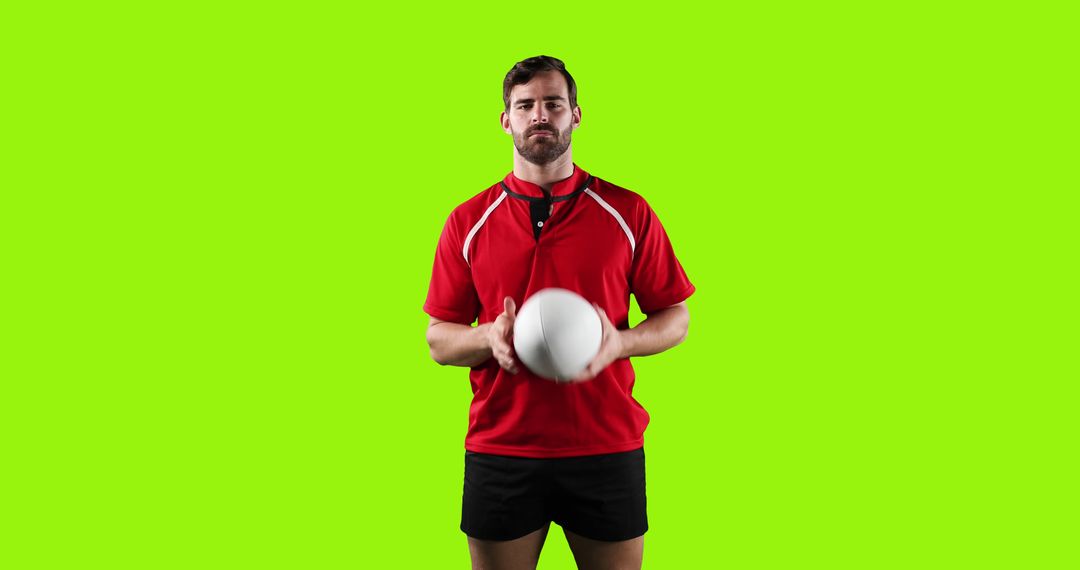 Rugby Player Wearing Red Jersey Holding Rugby Ball on Green Screen - Free Images, Stock Photos and Pictures on Pikwizard.com