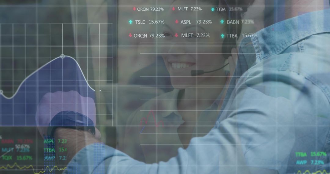 Man Pointing at Interactive Glass Dashboard Showing Financial Charts and Collaboration