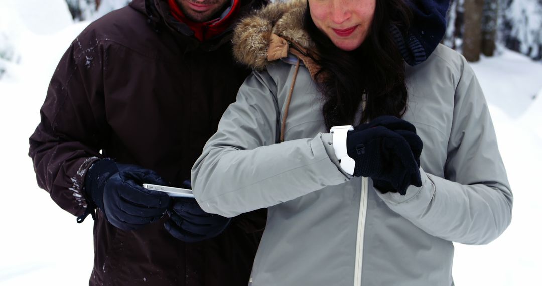 Couple Enjoys Winter Ski Adventure Dressed in Warm Outfits - Free Images, Stock Photos and Pictures on Pikwizard.com