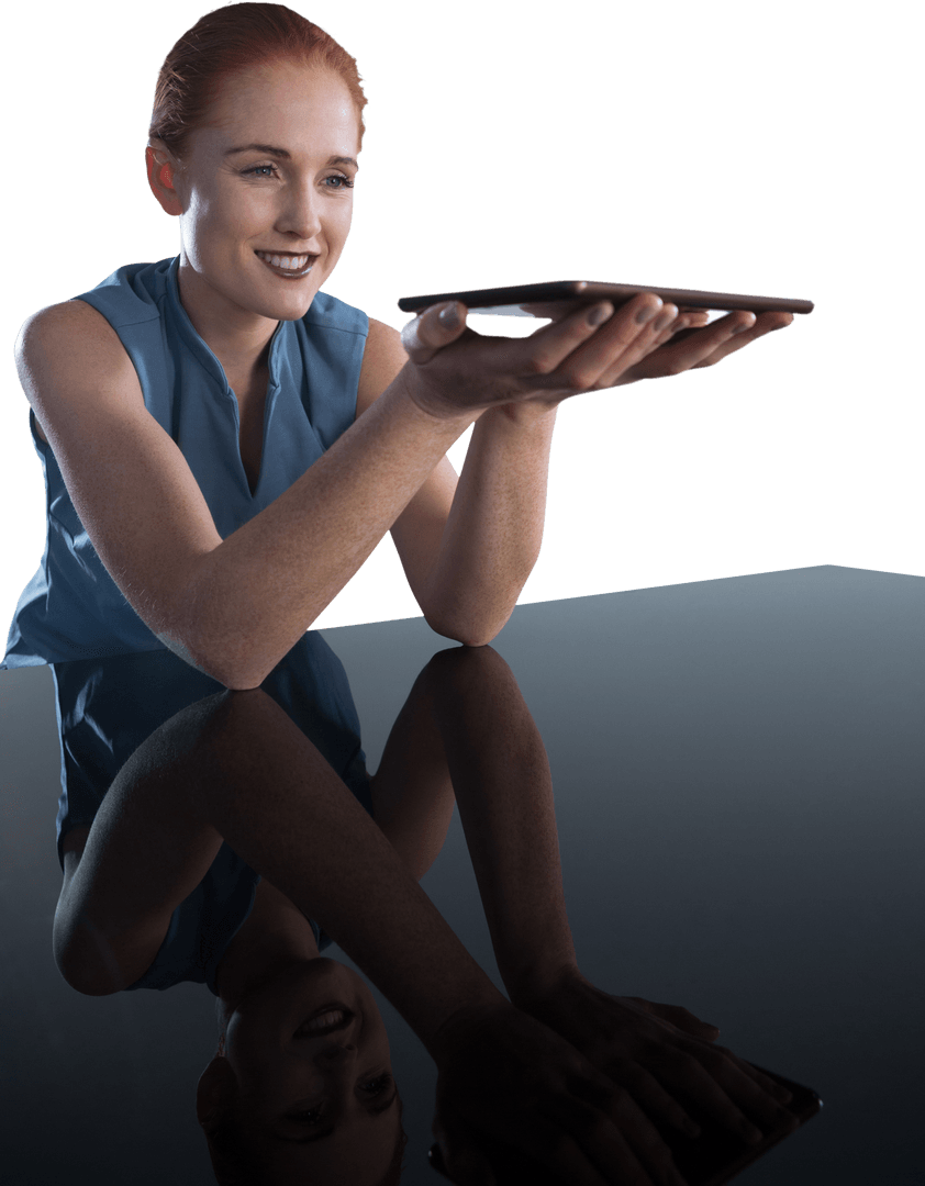 Smiling Businesswoman Reflecting with Transparent Tablet on Table