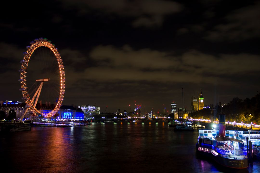 London Eye and Thames River at Night with Illuminated Lights - Free Images, Stock Photos and Pictures on Pikwizard.com