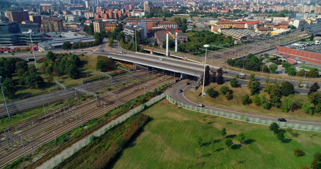 Aerial View of Urban Railway System in Busy Cityscape - Free Images, Stock Photos and Pictures on Pikwizard.com