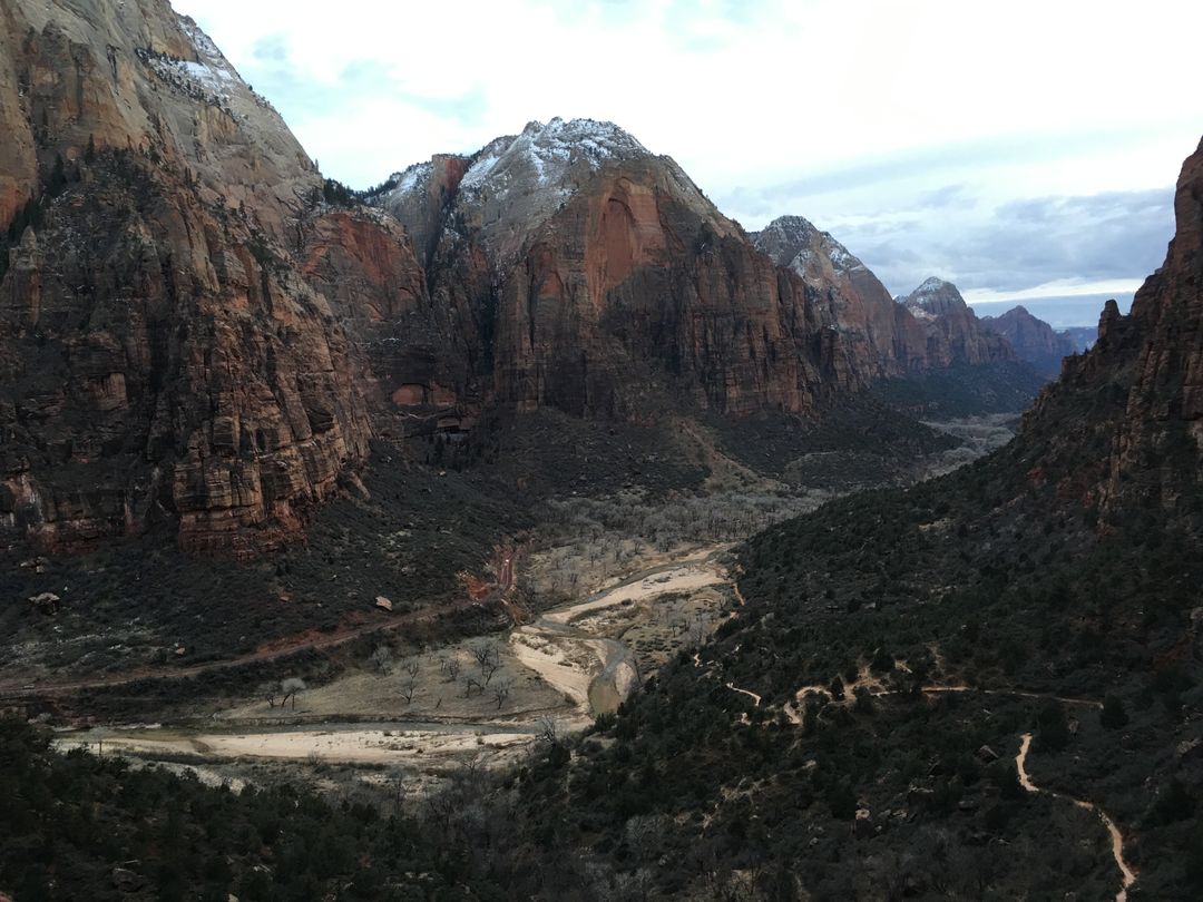 Scenic View of Zion Canyon with Snowcapped Peaks and River - Free Images, Stock Photos and Pictures on Pikwizard.com