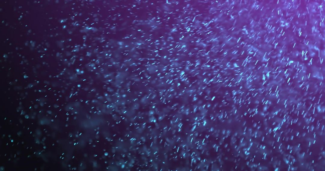 Vibrant Abstract Blue Particles Floating on Purple Gradient