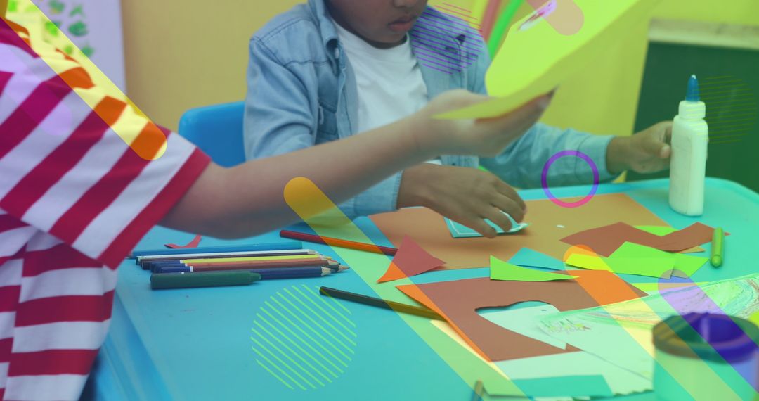 Creative Young Students Engaged in Art Project with Colorful Materials