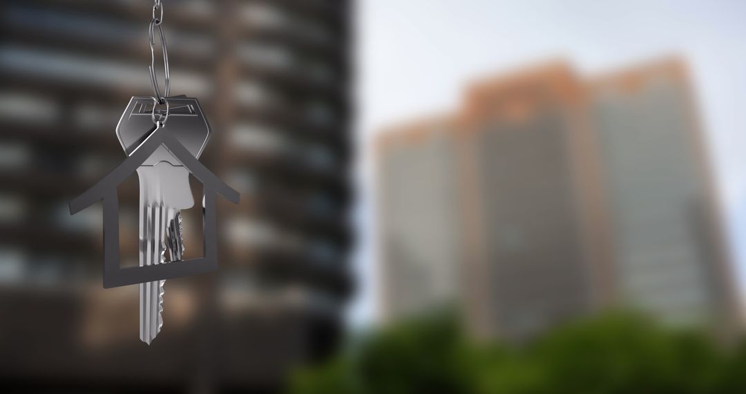 House-Shaped Keychain with Silver Keys and Urban Skyline