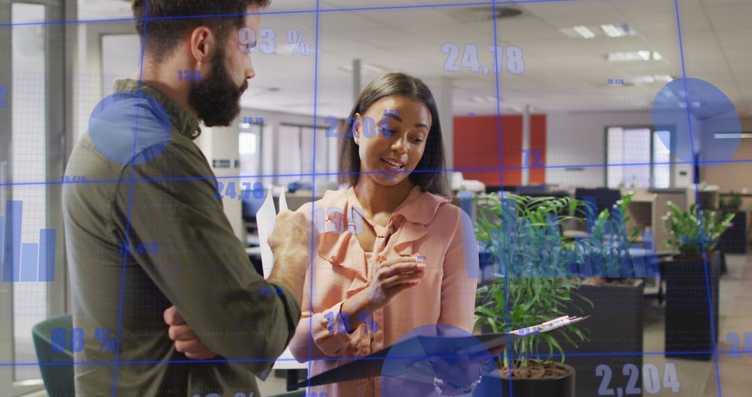 Business Team Analyzing Data Trends in Modern Office Environment