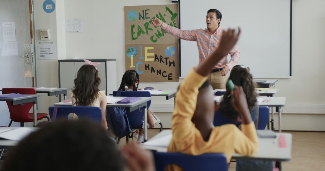 Elementary Teacher Discussing Environmental Awareness with Students - Free Images, Stock Photos and Pictures on Pikwizard.com