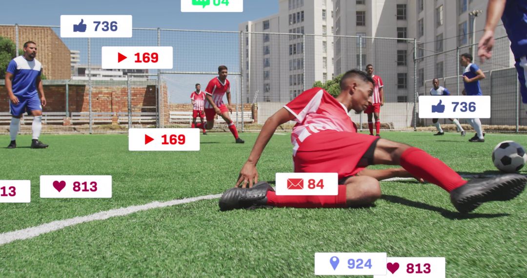 Soccer Player Slide Tackling on Field with Social Media Icons Overlay