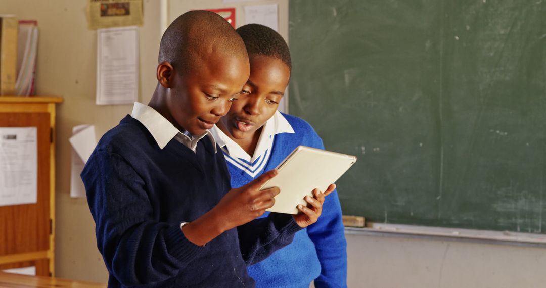 African Students Using Digital Tablet in Classroom - Free Images, Stock Photos and Pictures on Pikwizard.com