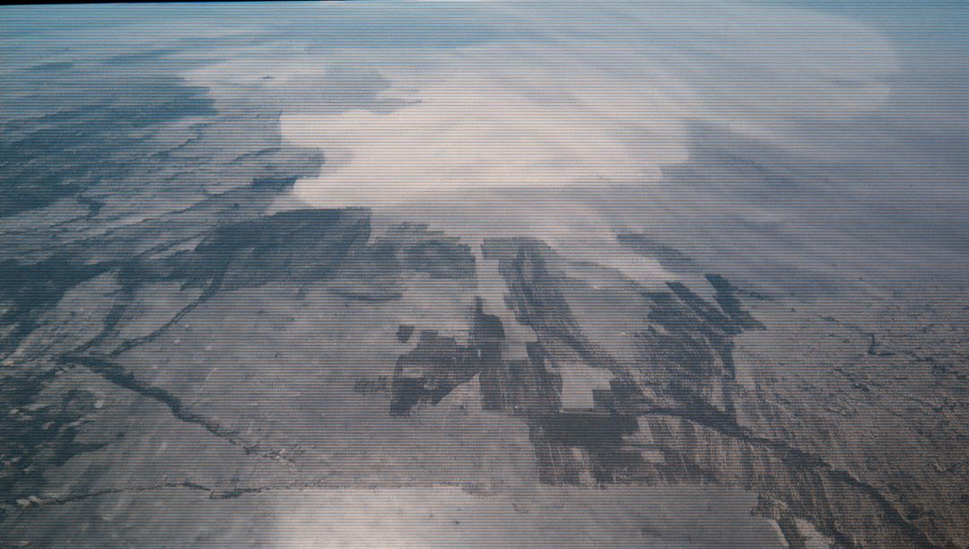 Breathtaking Aerial View of Patterns Across Expansive Farmland and Desert