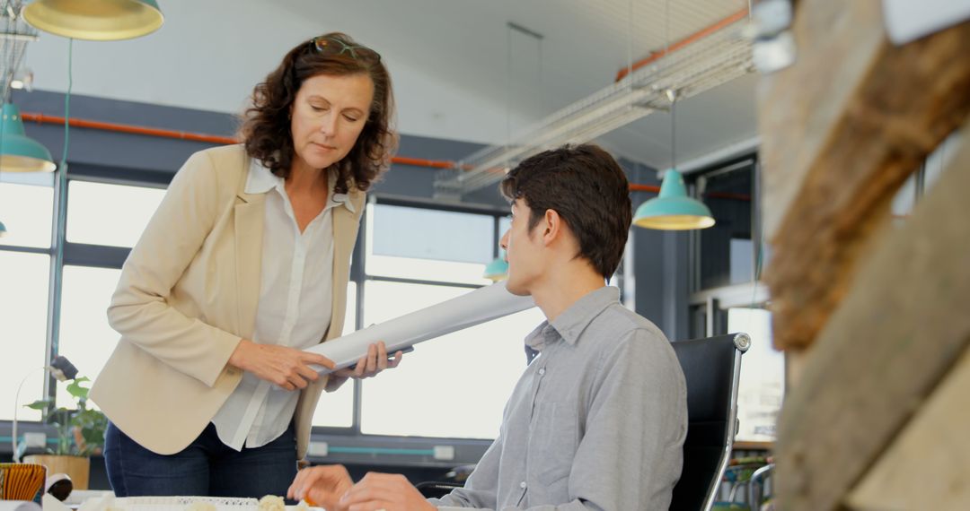 Collaborative Office Discussion on Project Planning