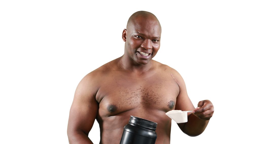 A muscular African American man is scooping protein powder from a container, with copy space - Free Images, Stock Photos and Pictures on Pikwizard.com