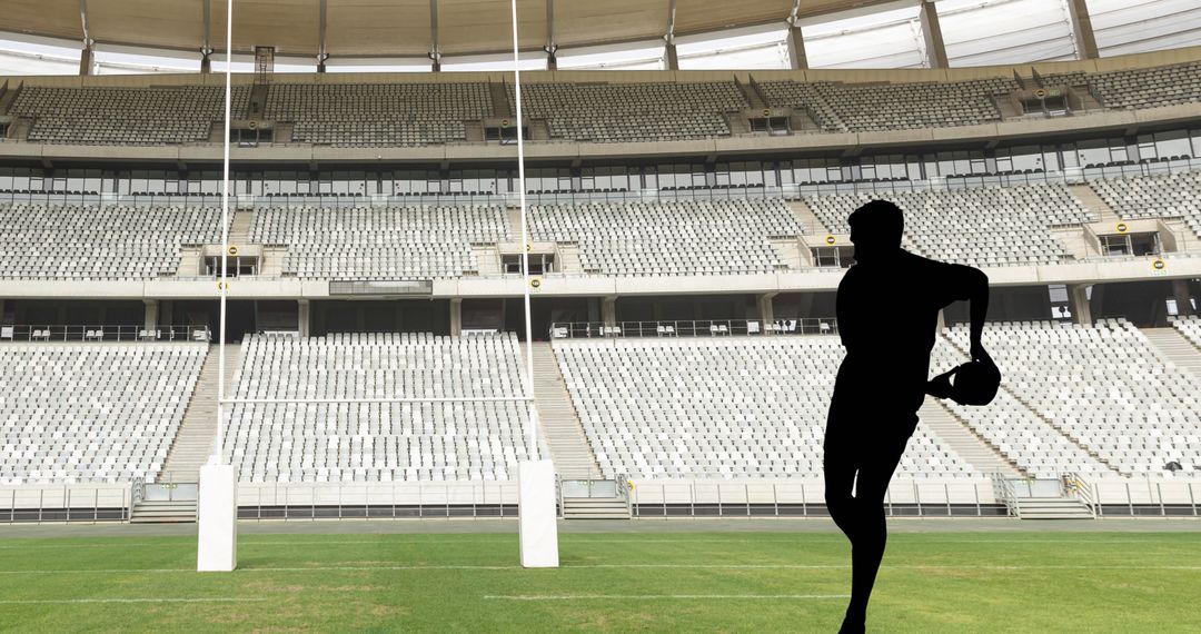 Rugby Player Silhouette in Massive Empty Stadium Scene