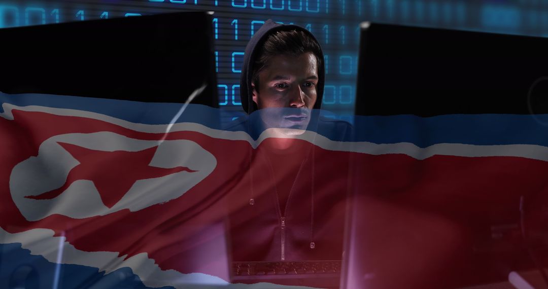 Hacker in Hoodie with North Korea Flag and Binary Code Overlay