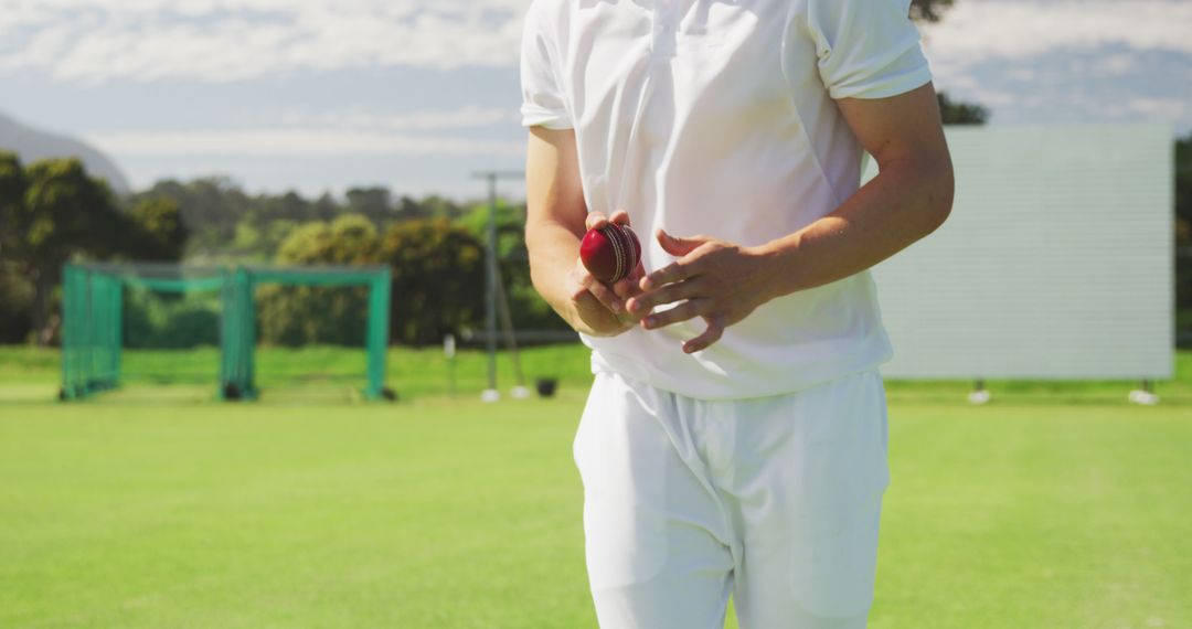 Cricket player preparing to bowl on sunny day - Free Images, Stock Photos and Pictures on Pikwizard.com