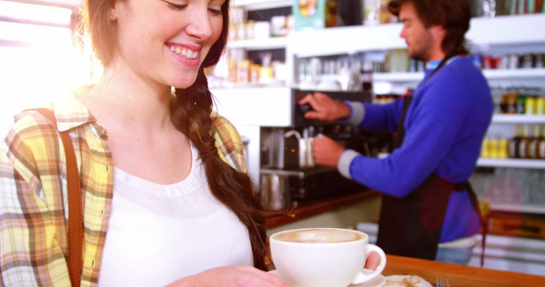 Woman Enjoying Cappuccino in Cozy Cafe - Free Images, Stock Photos and Pictures on Pikwizard.com