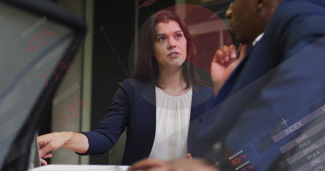 Diverse Business Team Discussing Data Reports and Infographics