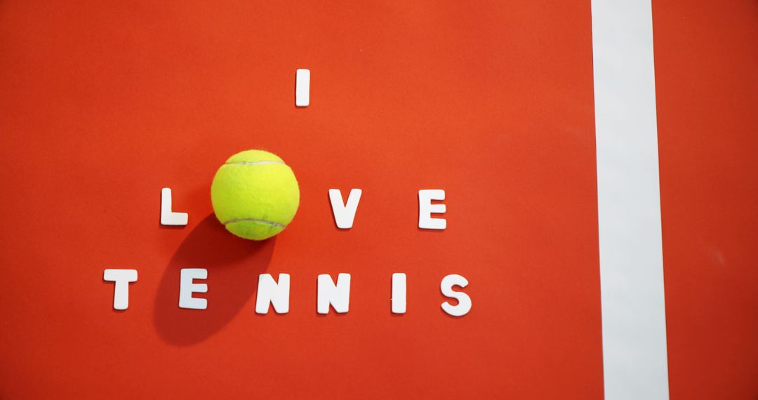 I Love Tennis Written with Letters and Ball on Red Court - Free Images, Stock Photos and Pictures on Pikwizard.com