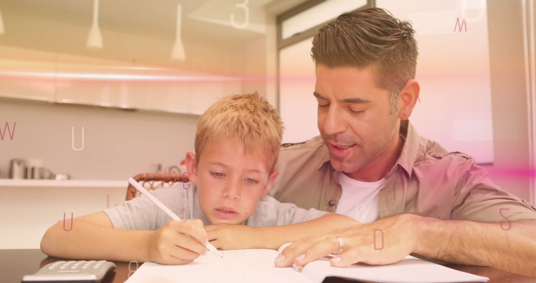 Father and Son Enjoying Learning Together at Home