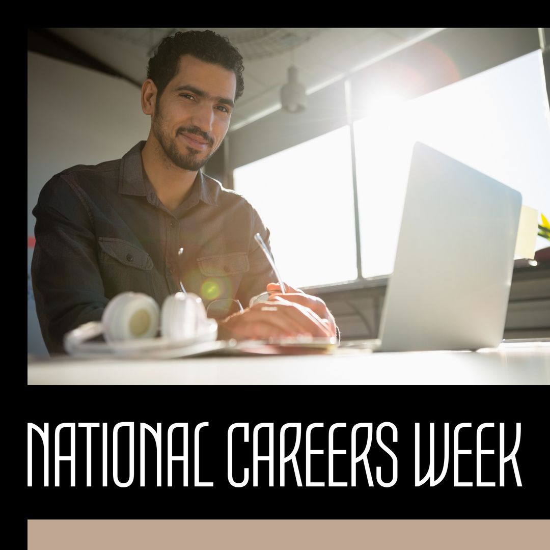 Confident Businessman Using Laptop in Bright Modern Office