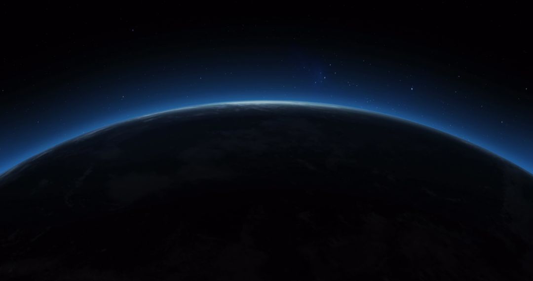 Earth's Curvature with Sunlight Creating Glowing Horizon in Space