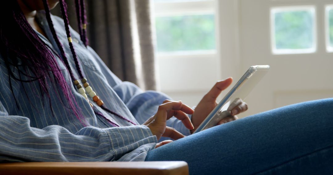 Woman Using Smartphone Indoors While Relaxing - Free Images, Stock Photos and Pictures on Pikwizard.com