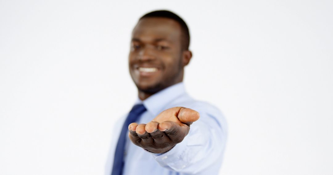 Confident Professional Offering Handshake with a Smile in White Background - Free Images, Stock Photos and Pictures on Pikwizard.com