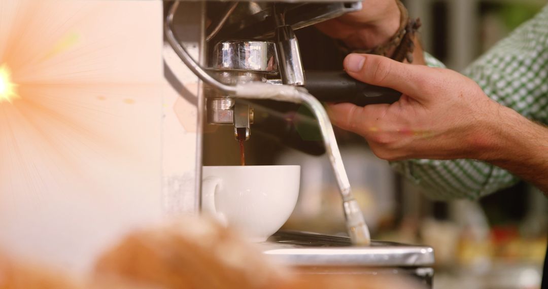 Barista Brewing Fresh Espresso in Cafe