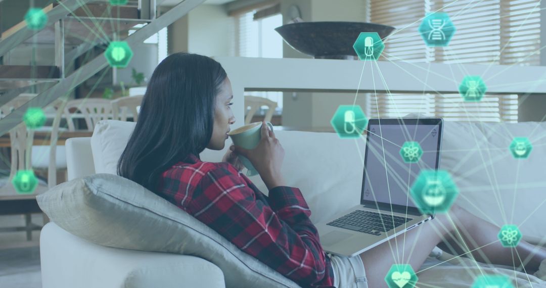 Woman Engaging with Digital Network on Laptop in Modern Living Space