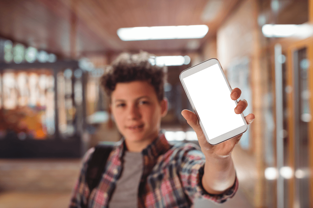Transparent Schoolboy with Mobile Phone in School Corridor