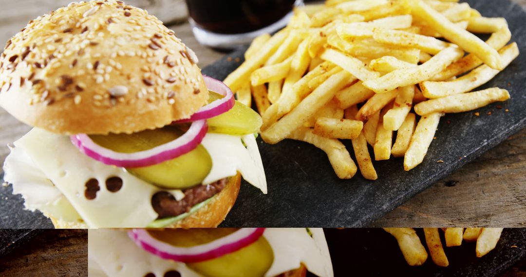 Delicious Cheeseburger with French Fries on Rustic Slate Plate - Free Images, Stock Photos and Pictures on Pikwizard.com