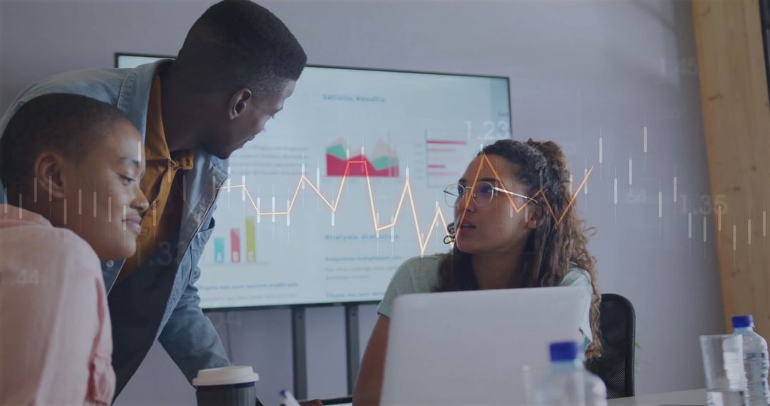 Diverse Team Discussing Business Analytics During Meeting