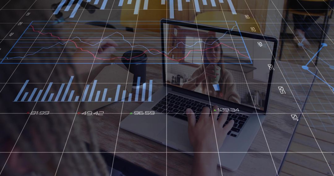 Woman Using Laptop for Remote Work with Digital Financial Graphs Overlay