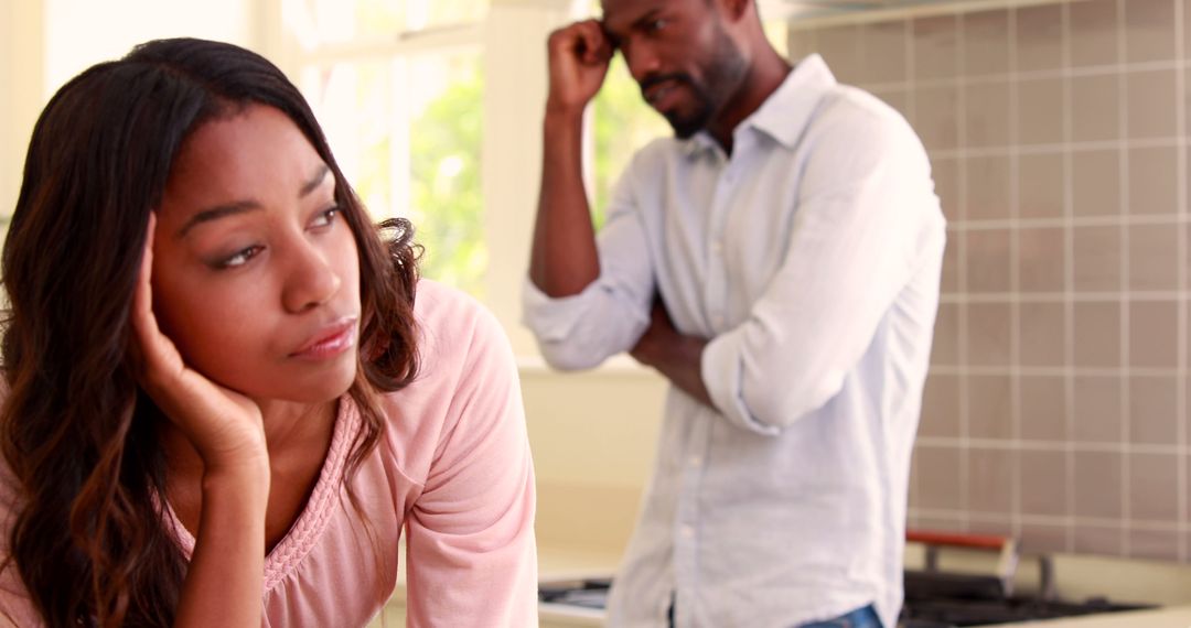 Upset Couple Experiencing Unspoken Tension at Home