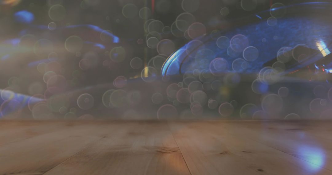 Wooden Tabletop and Colorful Bokeh Lights in Warm Studio Setting