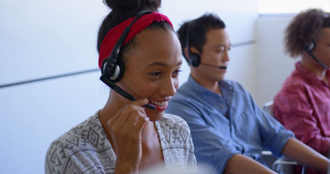 Customer Support Team with Diverse Professionals Using Headsets