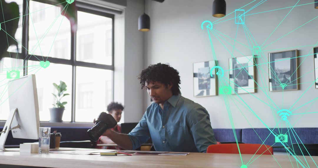 Creative Professional Managing Photography Projects in Modern Workspace