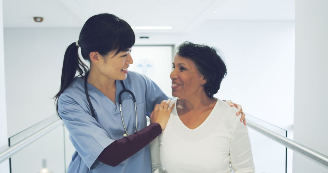 Nurse Supporting Elderly Woman with Compassionate Care - Free Images, Stock Photos and Pictures on Pikwizard.com