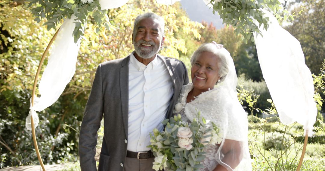 Senior Couple Smiling at Outdoor Wedding Ceremony - Free Images, Stock Photos and Pictures on Pikwizard.com