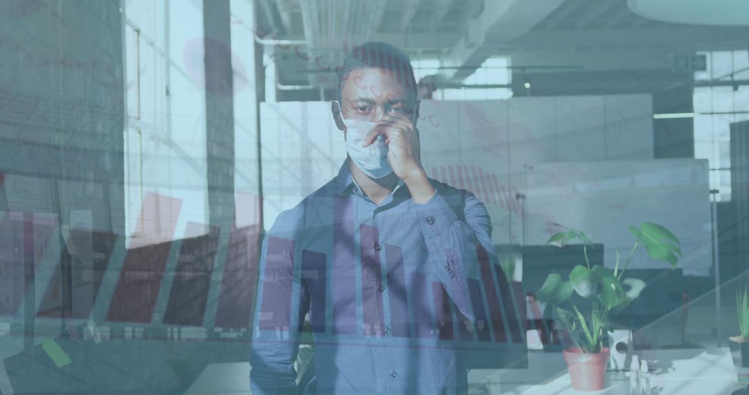 Professional Worker with Face Mask and Analytics Overlay in Office