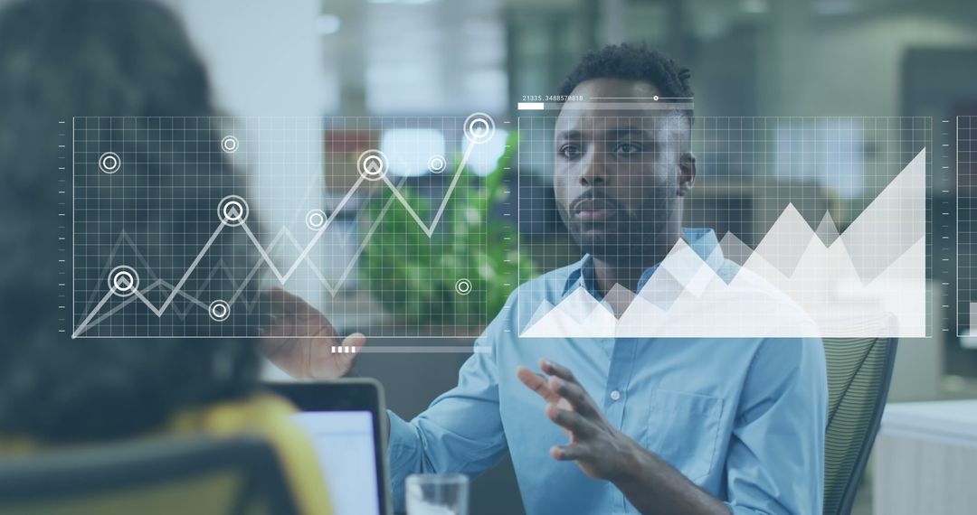 Confident Business Man Analyzing Future Growth Graphs