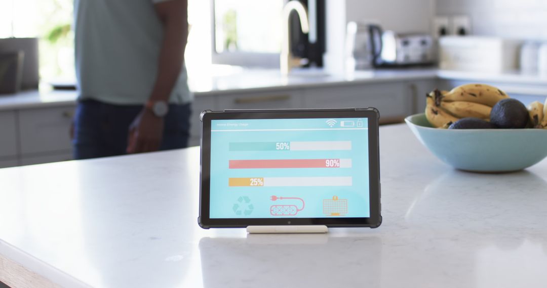 Smart Home App Displaying Energy Usage in Modern Kitchen